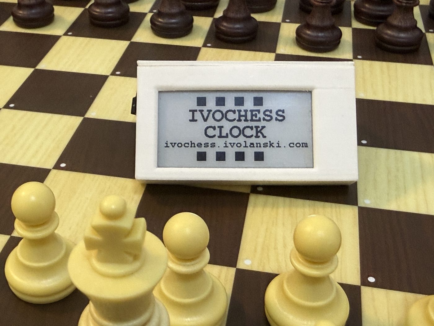 IvoChess Clock front view showing the branded startup screen